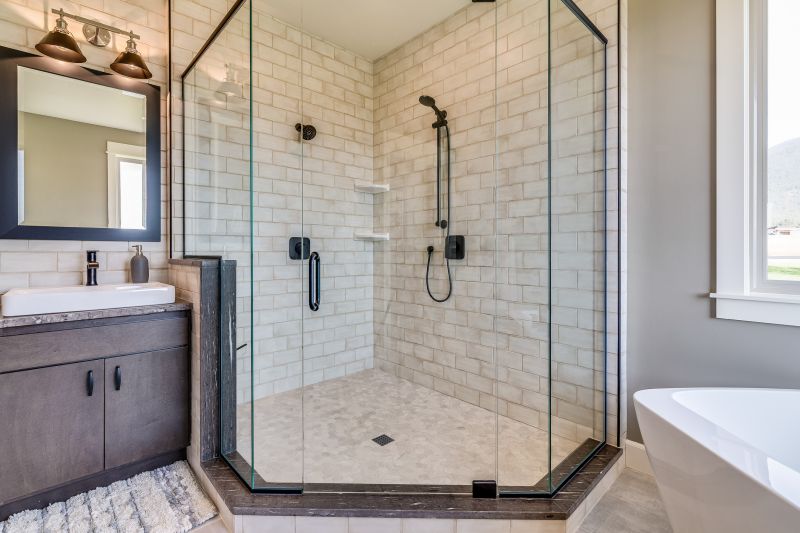 Black Framed Glass Shower with White Tiles